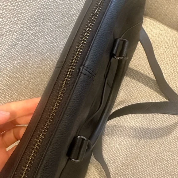 Black Leather Briefcase with Pebbled Texture and Structured Design